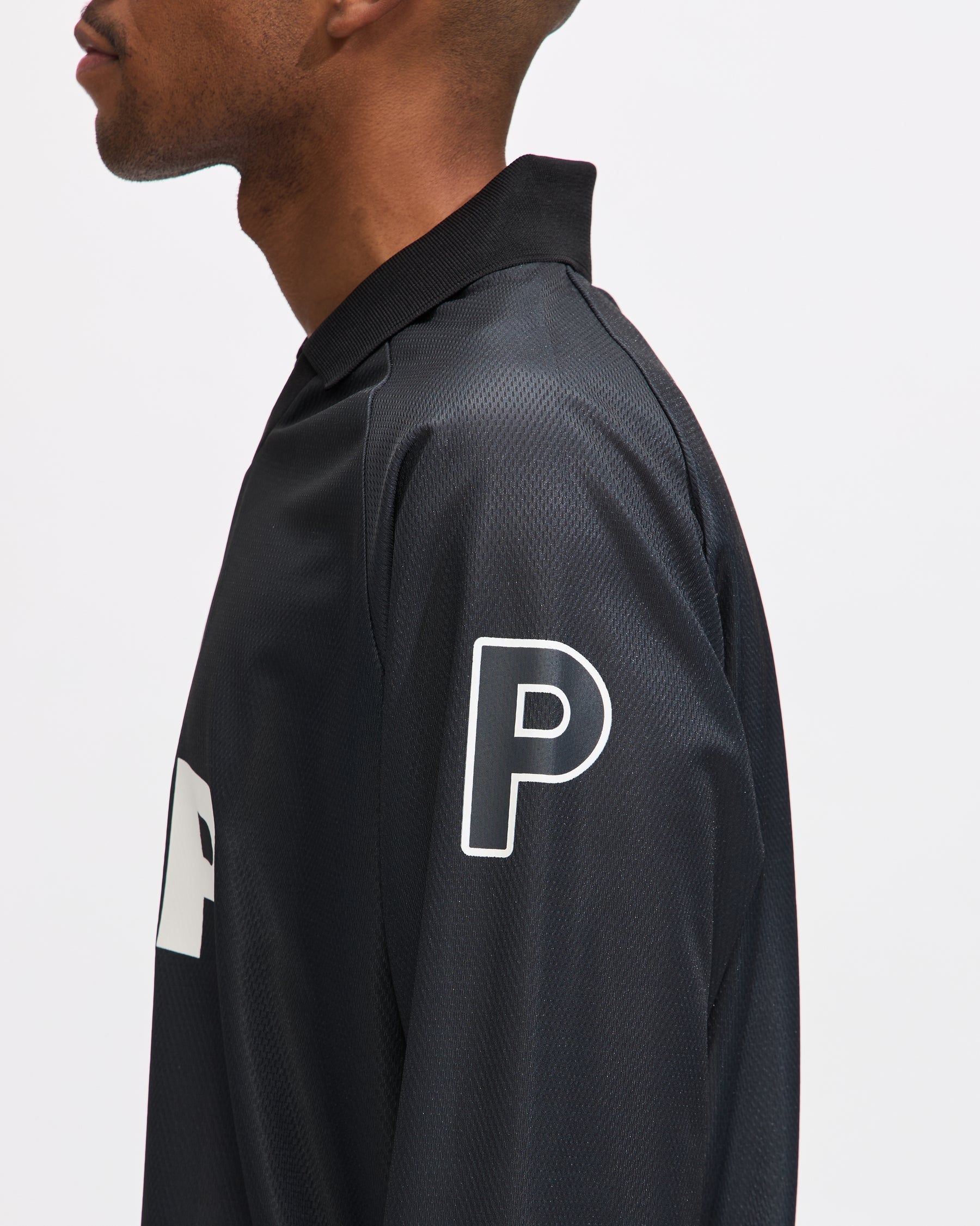 Pop Trading Company Pop Sportif Longsleeve Shirt in Black Homme Essentials