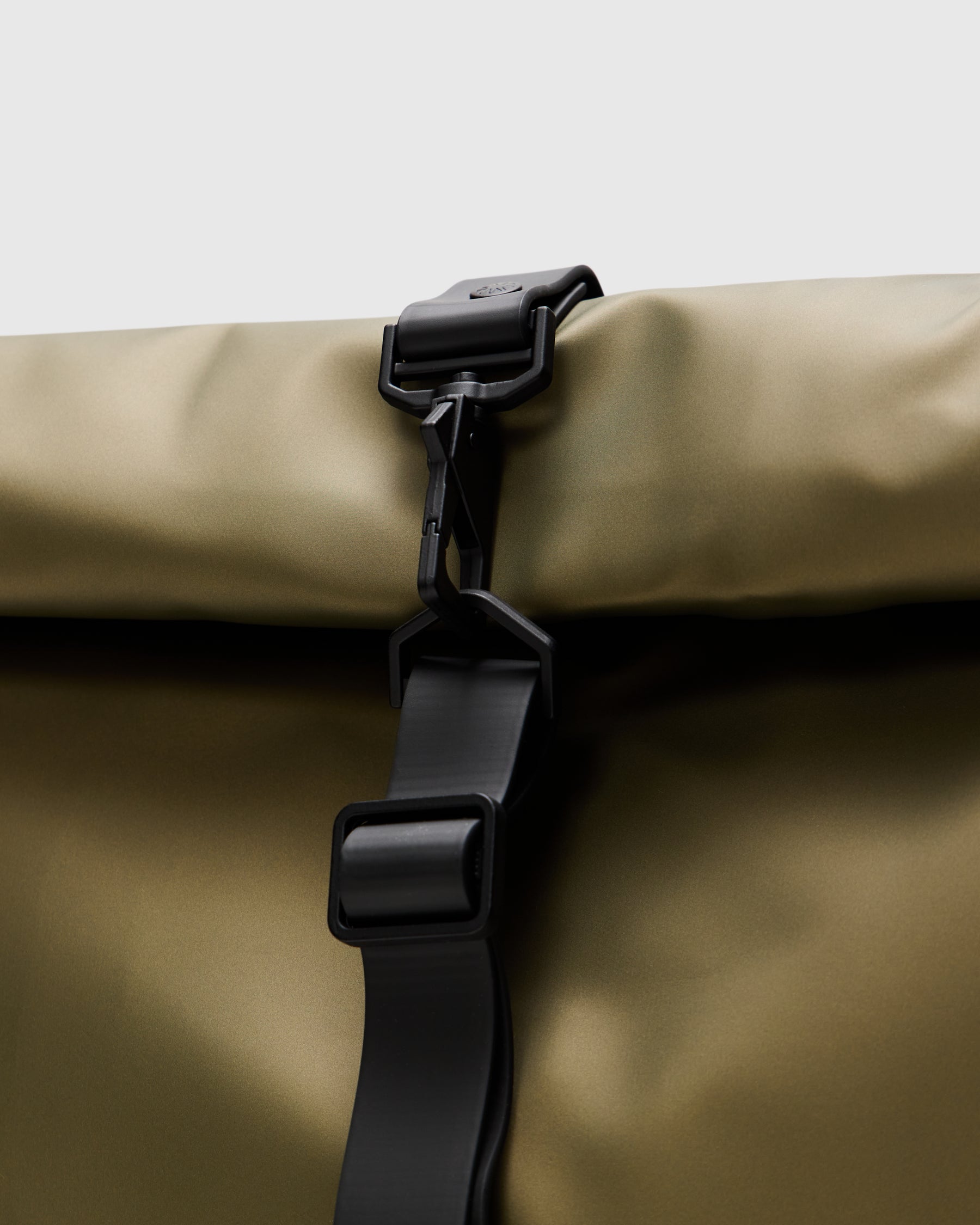 Rains Rolltop Rucksack in Revel Homme Essentials