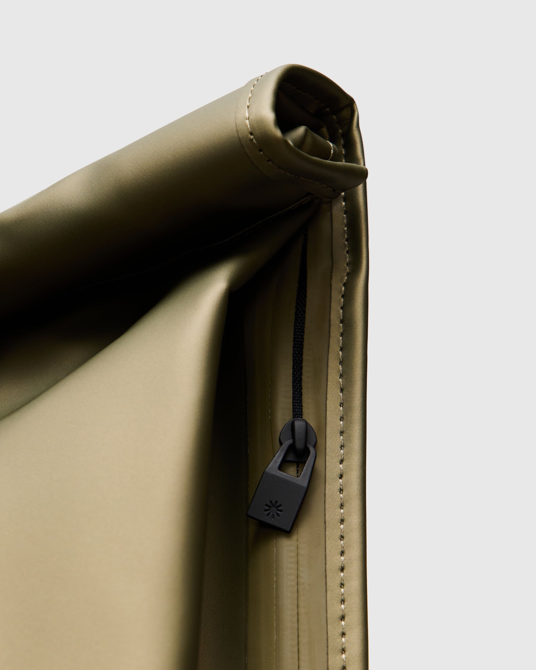 Rains Rolltop Rucksack in Revel Homme Essentials