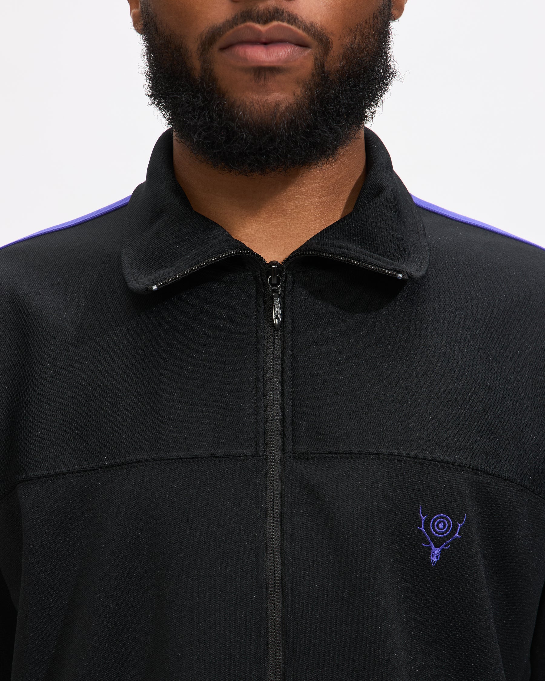 South2 West8 Trainer Jacket in Black Poly Smooth Homme Essentials