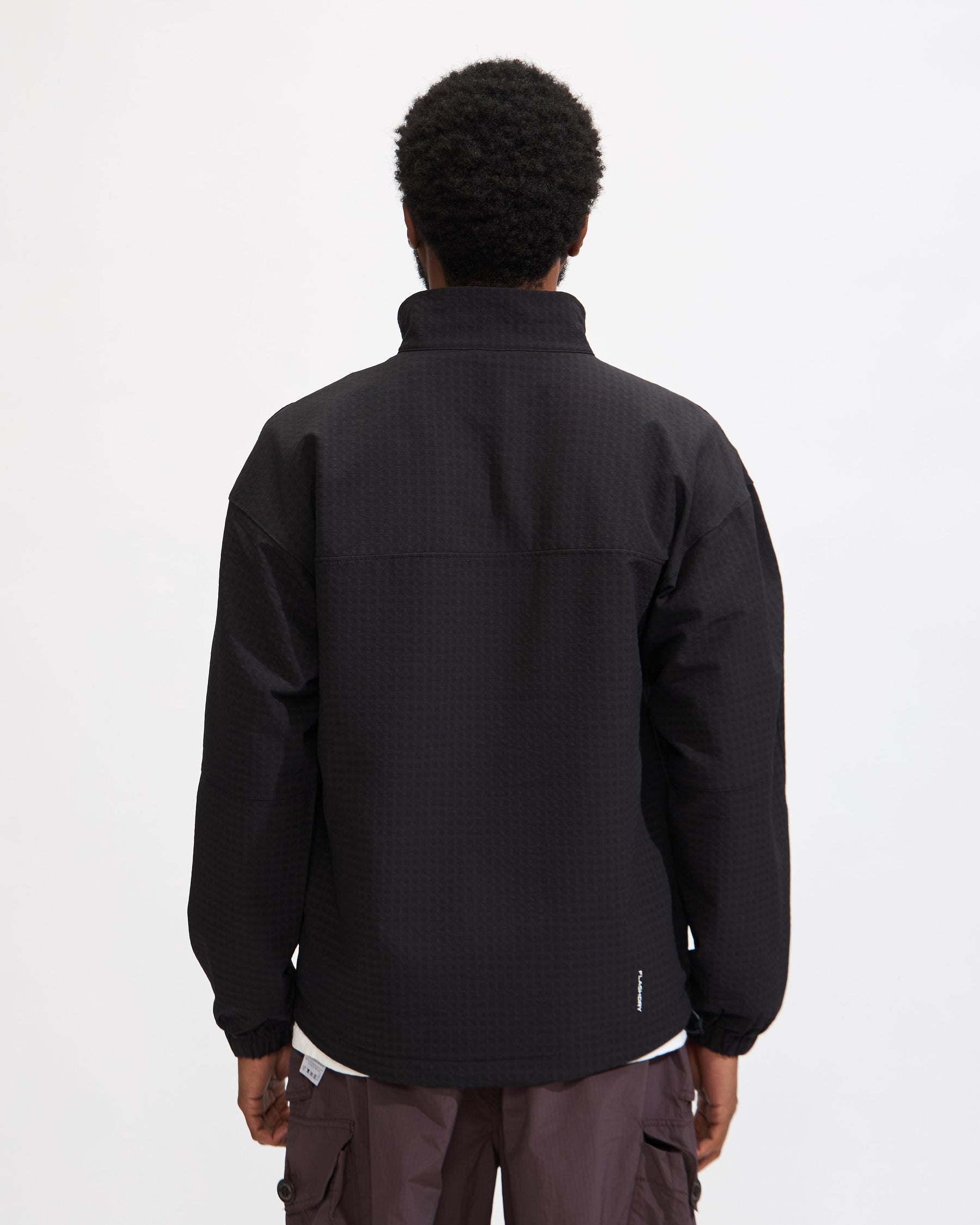 Tekware™ Grid ¼-Zip Jacket in TNF Black