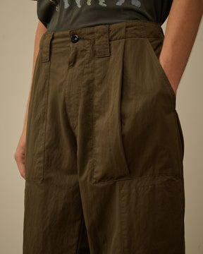 Diagonal Flatt Nylon Loose Pants in Ivy Green