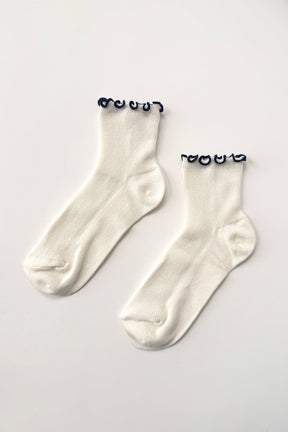 The Petite Ruffled Modal Socks in Soft White / Navy