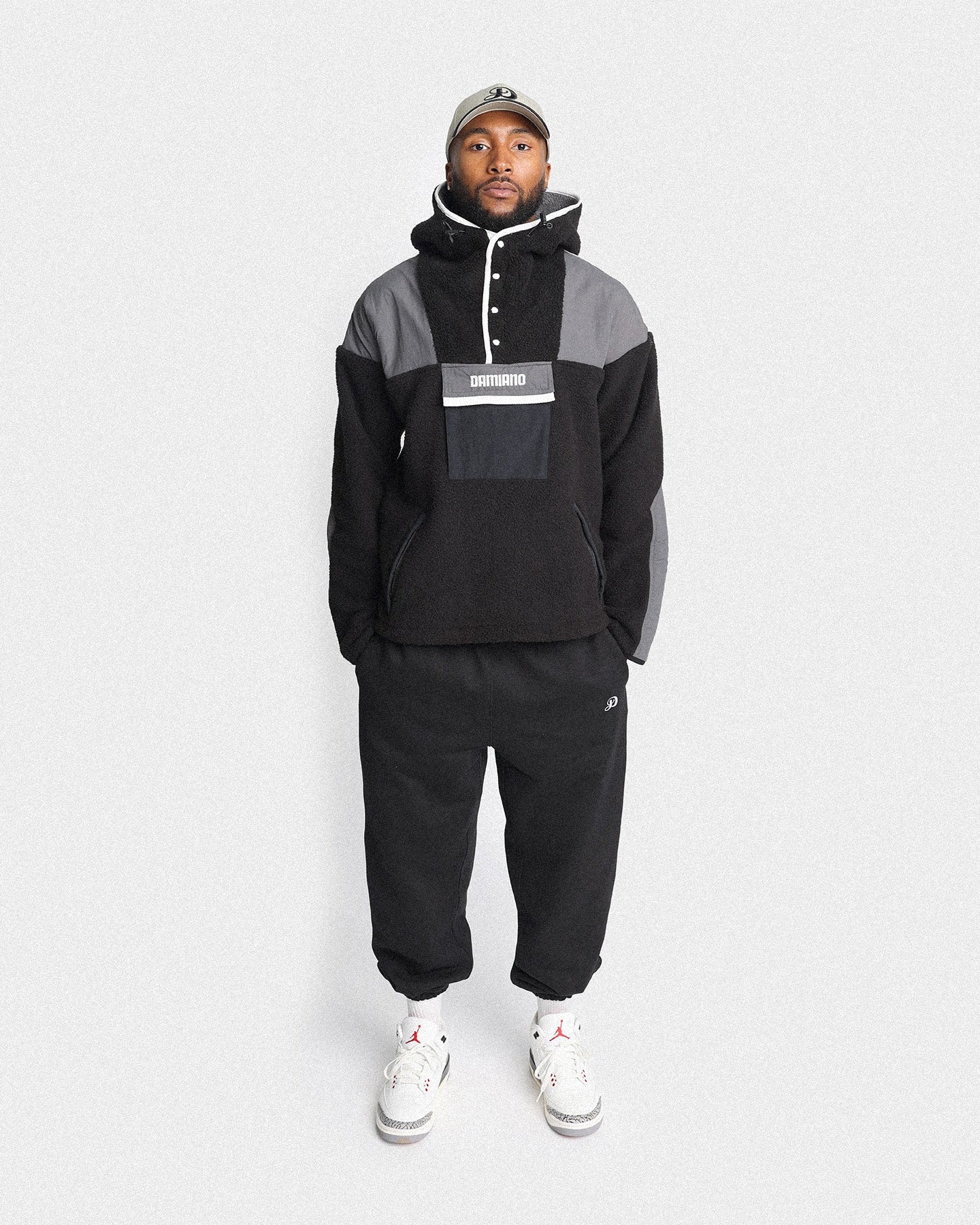 Hooded Sherpa Jacket in Black / Charcoal