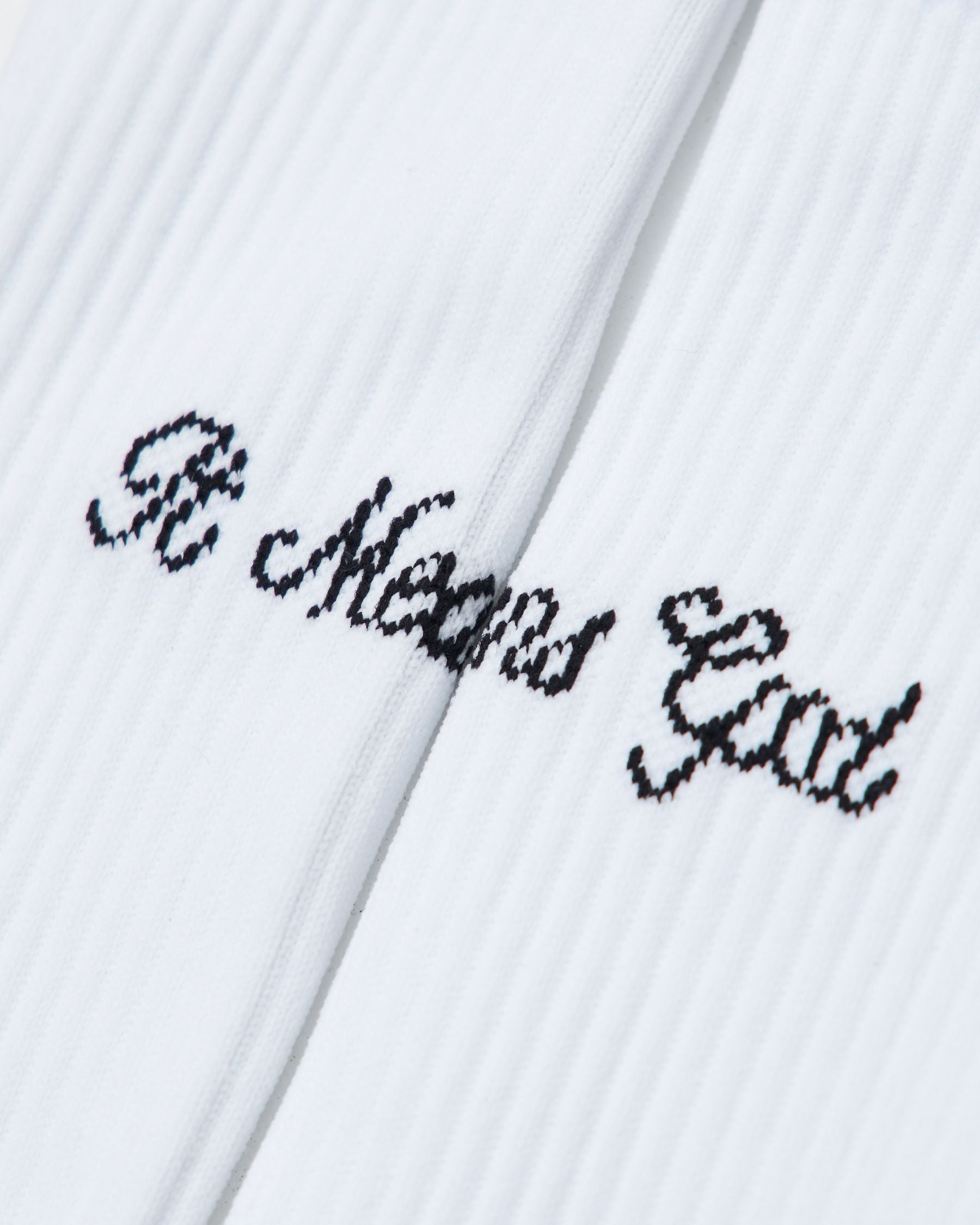 It Means Good Script Logo Socks in White